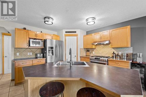 209 Tuscany Ravine Road Nw, Calgary, AB - Indoor Photo Showing Kitchen