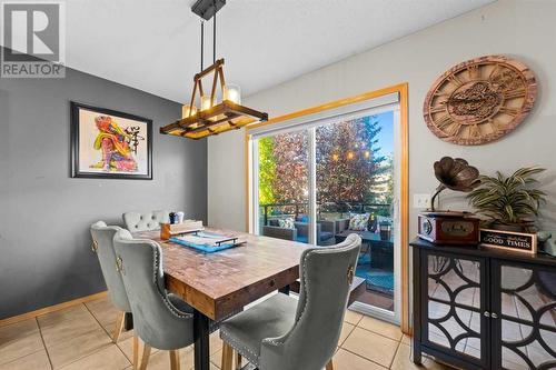 209 Tuscany Ravine Road Nw, Calgary, AB - Indoor Photo Showing Dining Room