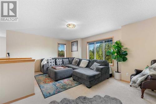 209 Tuscany Ravine Road Nw, Calgary, AB - Indoor Photo Showing Living Room