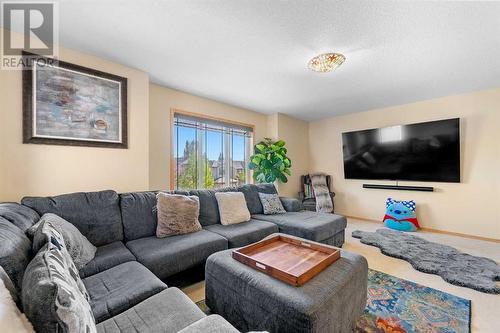 209 Tuscany Ravine Road Nw, Calgary, AB - Indoor Photo Showing Living Room