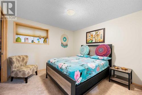 209 Tuscany Ravine Road Nw, Calgary, AB - Indoor Photo Showing Bedroom