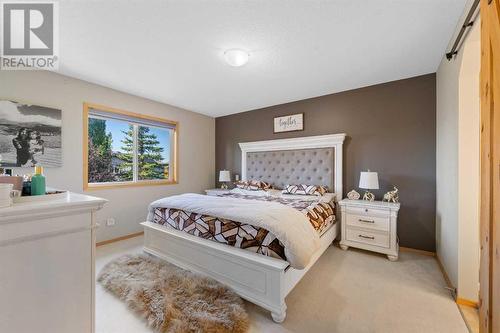 209 Tuscany Ravine Road Nw, Calgary, AB - Indoor Photo Showing Bedroom