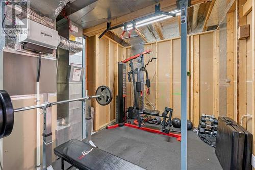 209 Tuscany Ravine Road Nw, Calgary, AB - Indoor Photo Showing Basement