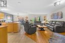 209 Tuscany Ravine Road Nw, Calgary, AB  - Indoor Photo Showing Living Room 