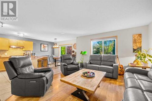 209 Tuscany Ravine Road Nw, Calgary, AB - Indoor Photo Showing Living Room