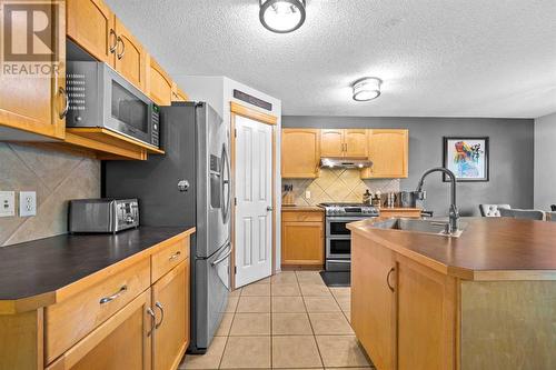 209 Tuscany Ravine Road Nw, Calgary, AB - Indoor Photo Showing Kitchen