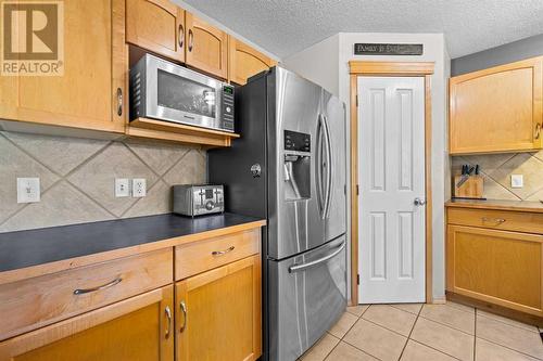 209 Tuscany Ravine Road Nw, Calgary, AB - Indoor Photo Showing Kitchen