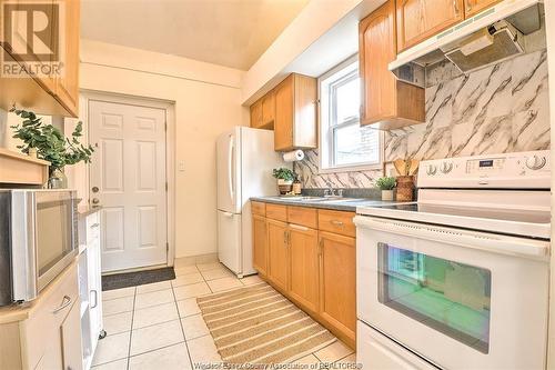 1317 Goyeau, Windsor, ON - Indoor Photo Showing Kitchen With Double Sink