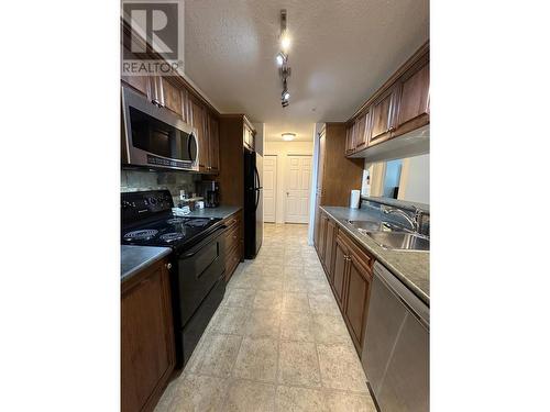 4767 Forsters Landing Road Unit# 210, Radium Hot Springs, BC - Indoor Photo Showing Kitchen With Double Sink