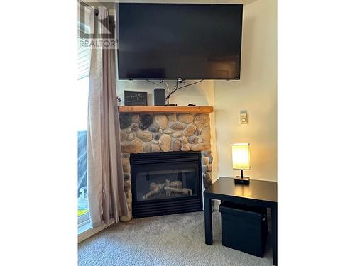 4767 Forsters Landing Road Unit# 210, Radium Hot Springs, BC - Indoor Photo Showing Living Room With Fireplace