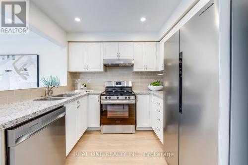 22 Sloan Drive, Milton (Dempsey), ON - Indoor Photo Showing Kitchen With Double Sink