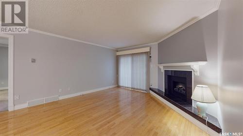 1204 Gryphons Walk, Regina, SK - Indoor With Fireplace