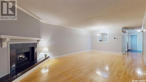 1204 Gryphons Walk, Regina, SK - Indoor With Fireplace