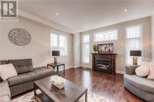 313 Zeller Drive, Kitchener, ON - Indoor Photo Showing Living Room With Fireplace