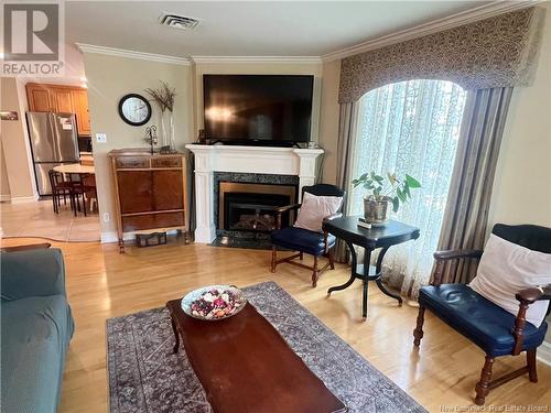 102 St. George Street, Bathurst, NB - Indoor Photo Showing Living Room With Fireplace