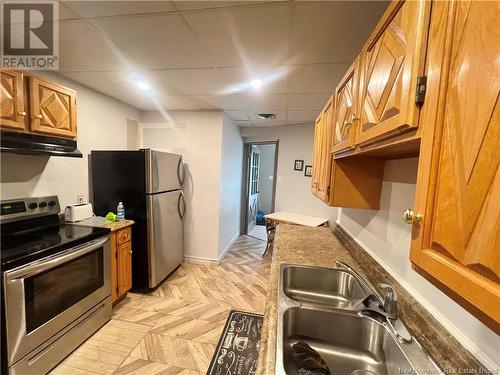 102 St. George Street, Bathurst, NB - Indoor Photo Showing Kitchen With Double Sink