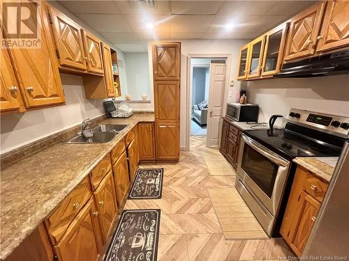 102 St. George Street, Bathurst, NB - Indoor Photo Showing Kitchen With Double Sink