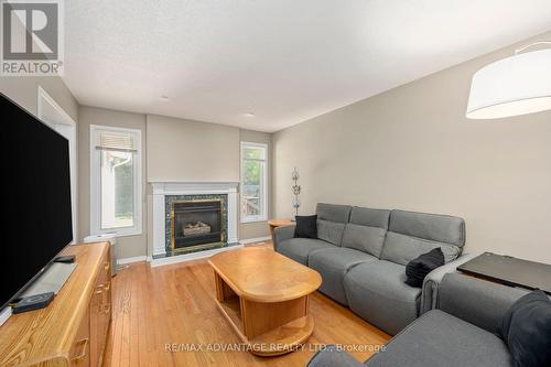 145 Bournemouth Drive, London, ON - Indoor Photo Showing Living Room With Fireplace