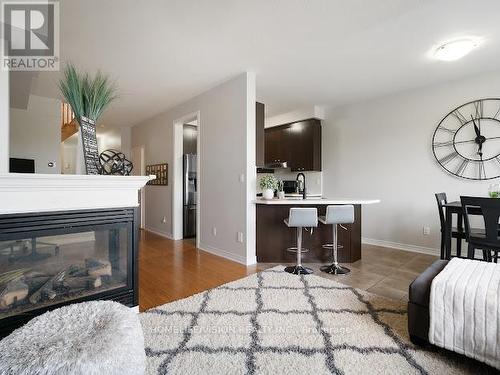 100 Gosnel Circle, Bradford West Gwillimbury (Bradford), ON - Indoor Photo Showing Living Room With Fireplace