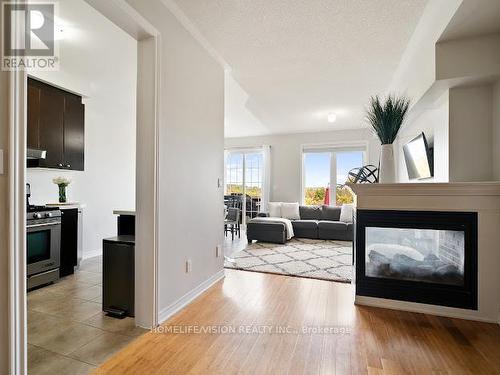 100 Gosnel Circle, Bradford West Gwillimbury (Bradford), ON - Indoor Photo Showing Other Room With Fireplace