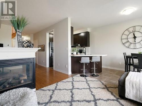 100 Gosnel Circle, Bradford West Gwillimbury (Bradford), ON - Indoor Photo Showing Living Room With Fireplace