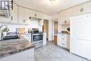 6582 Yonge Street, Innisfil, ON  - Indoor Photo Showing Kitchen With Double Sink 