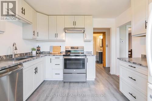 6582 Yonge Street, Innisfil, ON - Indoor Photo Showing Kitchen With Double Sink