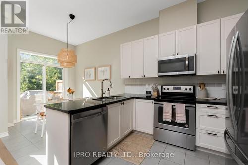 7 Blasi Court, Wasaga Beach, ON - Indoor Photo Showing Kitchen With Stainless Steel Kitchen With Double Sink With Upgraded Kitchen