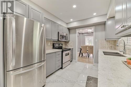 62 Bramhall Circle, Brampton, ON - Indoor Photo Showing Kitchen With Stainless Steel Kitchen With Double Sink With Upgraded Kitchen