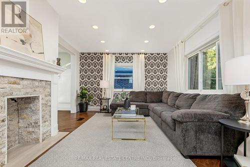 15 College Street, Toronto, ON - Indoor Photo Showing Living Room With Fireplace