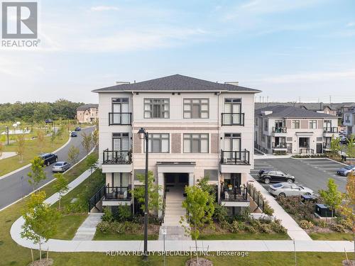 406 - 70 Halliford Place, Brampton, ON - Outdoor With Balcony With Facade