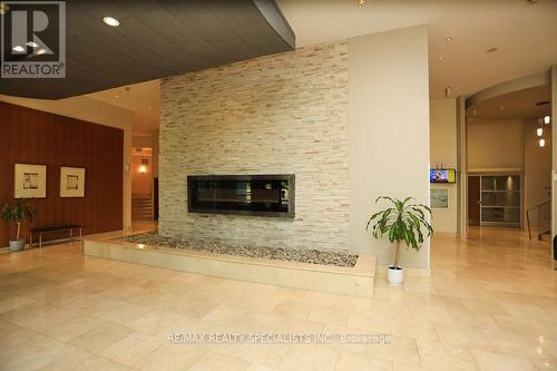 1705 - 220 Burnhamthorpe Road, Mississauga, ON - Indoor With Fireplace