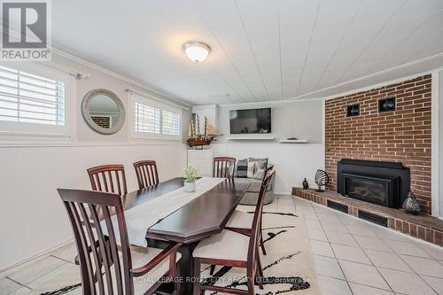 17 Ryan Avenue, Guelph, ON - Indoor Photo Showing Dining Room With Fireplace