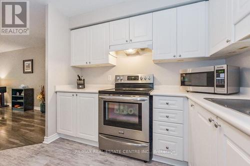 103 - 245 Queen Street W, Centre Wellington, ON - Indoor Photo Showing Kitchen