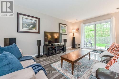 103 - 245 Queen Street W, Centre Wellington, ON - Indoor Photo Showing Living Room