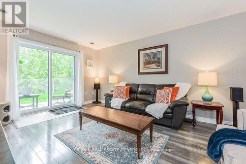 103 - 245 Queen Street W, Centre Wellington, ON - Indoor Photo Showing Living Room