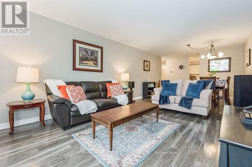 103 - 245 Queen Street W, Centre Wellington, ON - Indoor Photo Showing Living Room