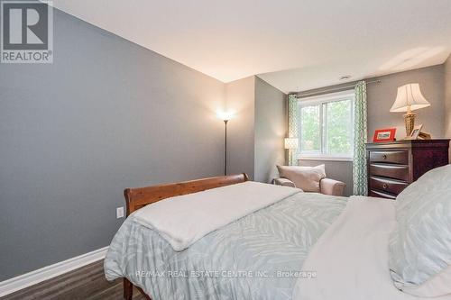 103 - 245 Queen Street W, Centre Wellington, ON - Indoor Photo Showing Bedroom