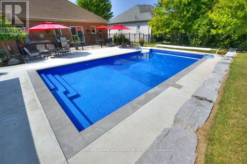 25 John Ross Court, Wilmot, ON - Outdoor With In Ground Pool With Backyard