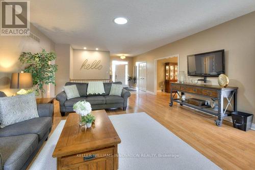 25 John Ross Court, Wilmot, ON - Indoor Photo Showing Living Room With Fireplace