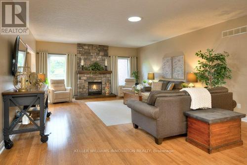 25 John Ross Court, Wilmot, ON - Indoor Photo Showing Living Room With Fireplace