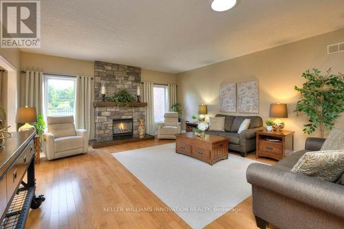 25 John Ross Court, Wilmot, ON - Indoor Photo Showing Living Room With Fireplace