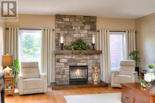 25 John Ross Court, Wilmot, ON - Indoor Photo Showing Living Room With Fireplace