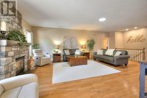 25 John Ross Court, Wilmot, ON - Indoor Photo Showing Living Room With Fireplace