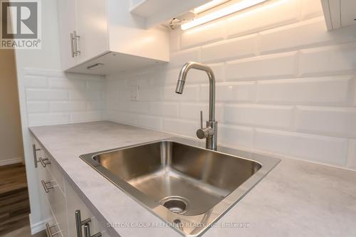 305-600 Grenfell Drive, London, ON - Indoor Photo Showing Kitchen With Double Sink