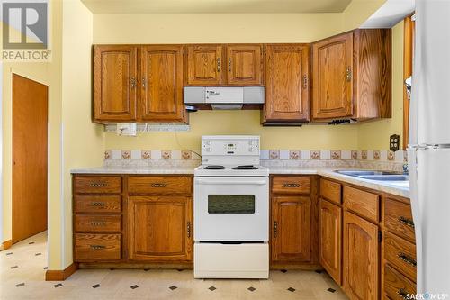 1106 Hastings Street, Moose Jaw, SK - Indoor Photo Showing Kitchen With Double Sink