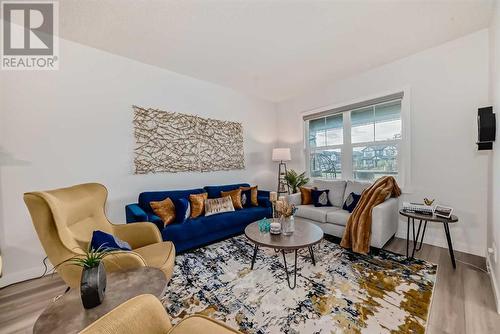 114 Midgrove Greenway Sw, Airdrie, AB - Indoor Photo Showing Living Room