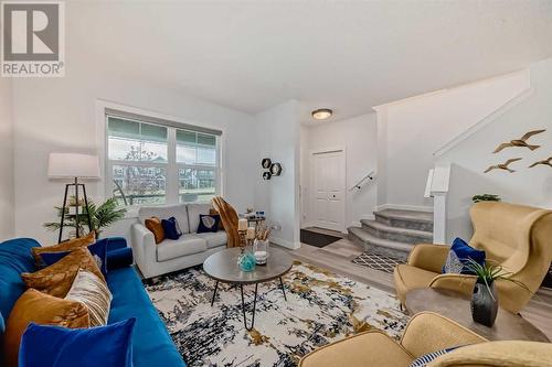 114 Midgrove Greenway Sw, Airdrie, AB - Indoor Photo Showing Living Room