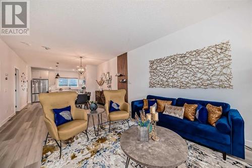 114 Midgrove Greenway Sw, Airdrie, AB - Indoor Photo Showing Living Room