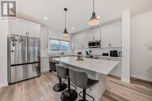 114 Midgrove Greenway Sw, Airdrie, AB - Indoor Photo Showing Kitchen With Stainless Steel Kitchen With Upgraded Kitchen